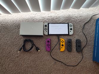 Nintendo Switch OLED with 2 Extra Pairs of Joycons (READ DESCRIPTION)