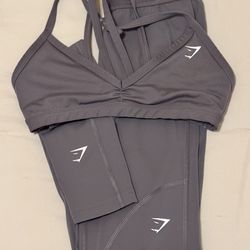 Gymshark activewear.  Selling a Gymshark 2-piece workout set that includes leggings and a sports bra. Perfect for gym, workouts, yoga, or everyday act