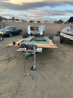 A car trailer, beautiful Two 10k Axle -control -heavy duty -put trucks on - the car is gone. -Boat’s been on it. Just a great trailer