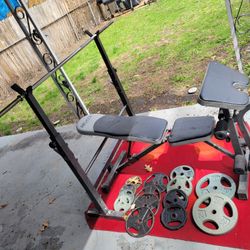 ADJUSTABLE. BENCH LEG. EXTENSION  WITH ATTACHED CURL BAR.  PREACHER PAD 1" HOLE  6' BAR. 120LBs PLATES 
11525 S HALSTED DUNKIN DONUTS/7111.S WESTERN W