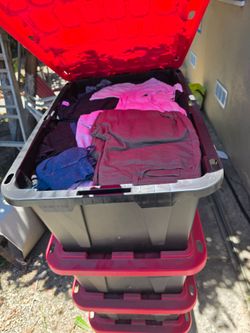 27 gallon bin full of clothes, random sizes. Women's bin, kids bin and mens bin available