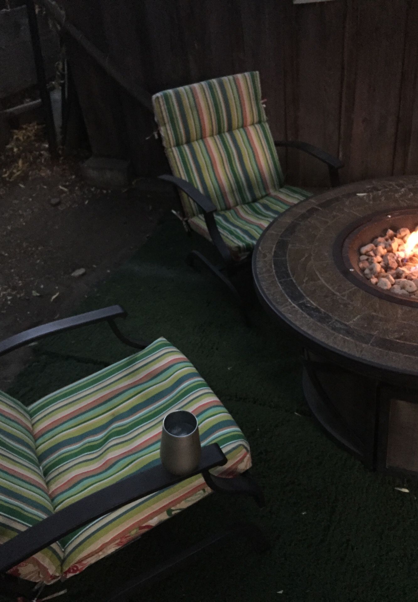 Propane fire table with 4 rocking chairs and cushions 