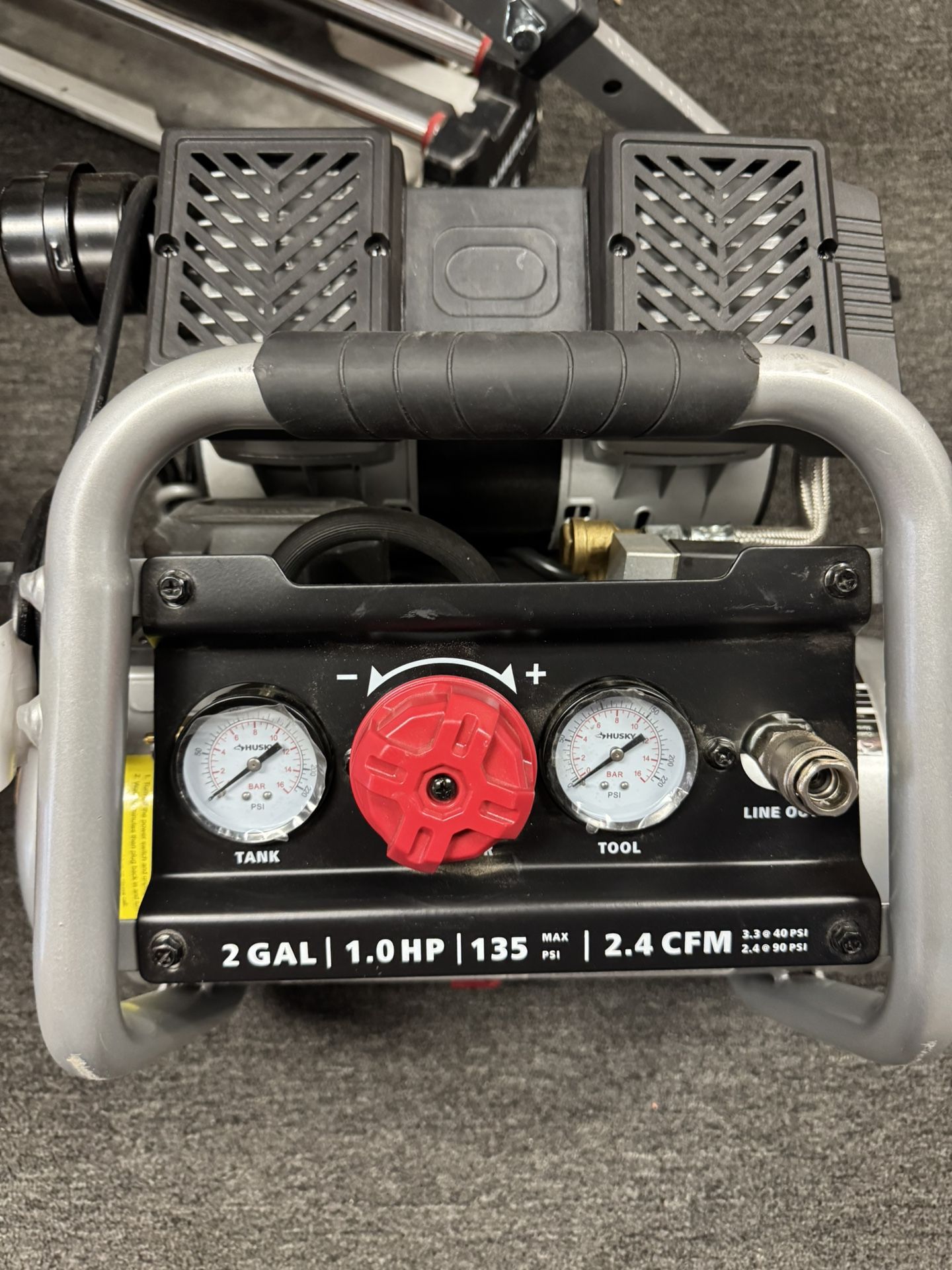 Husky 2 Gal. 135 PSI Portable Electric Oil-Free Quiet Jobsite Air Compressor with Dual Pressure Gauges and 1-Quick Coupler