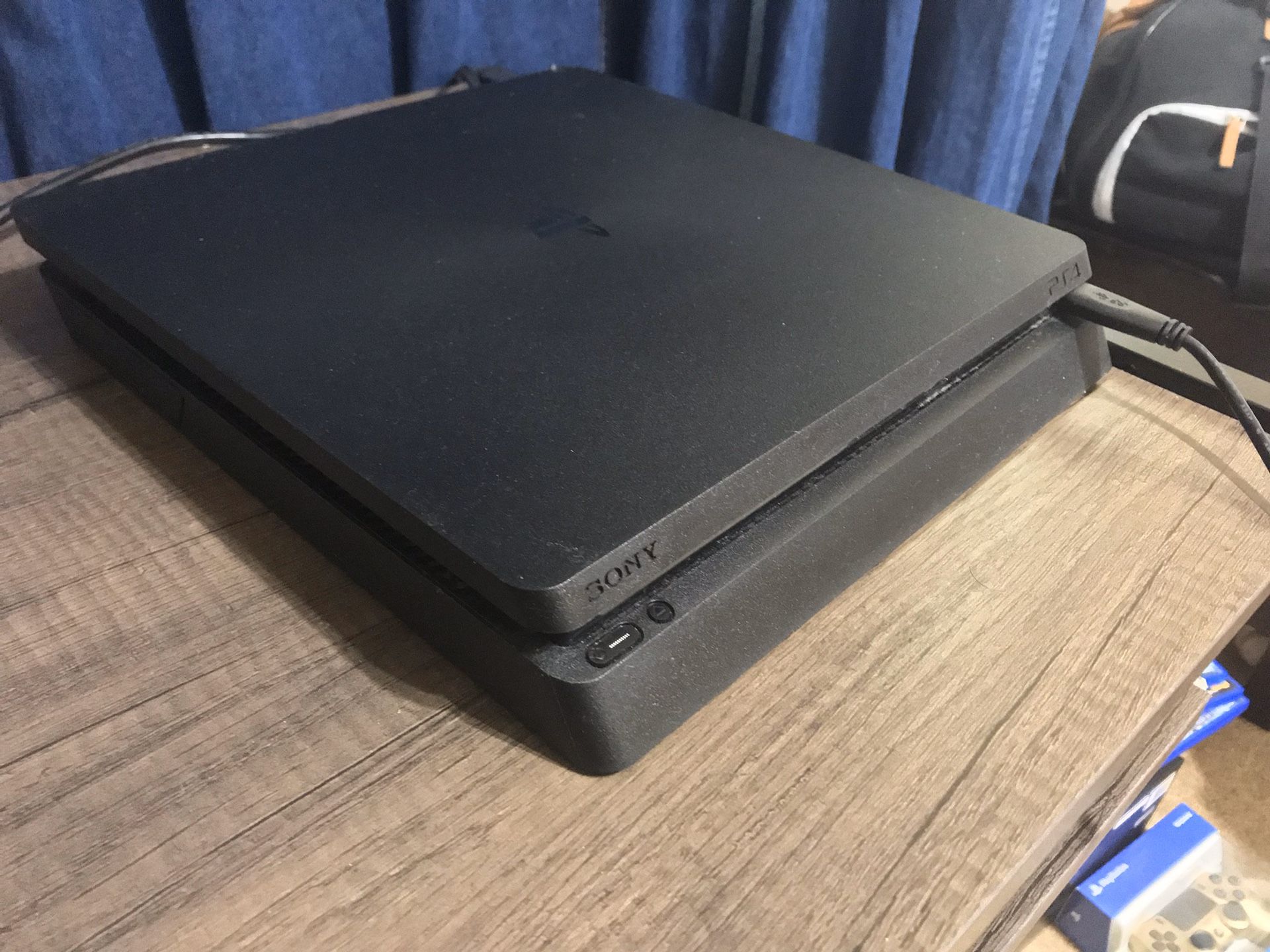 PS4 slim 1TB with 8games