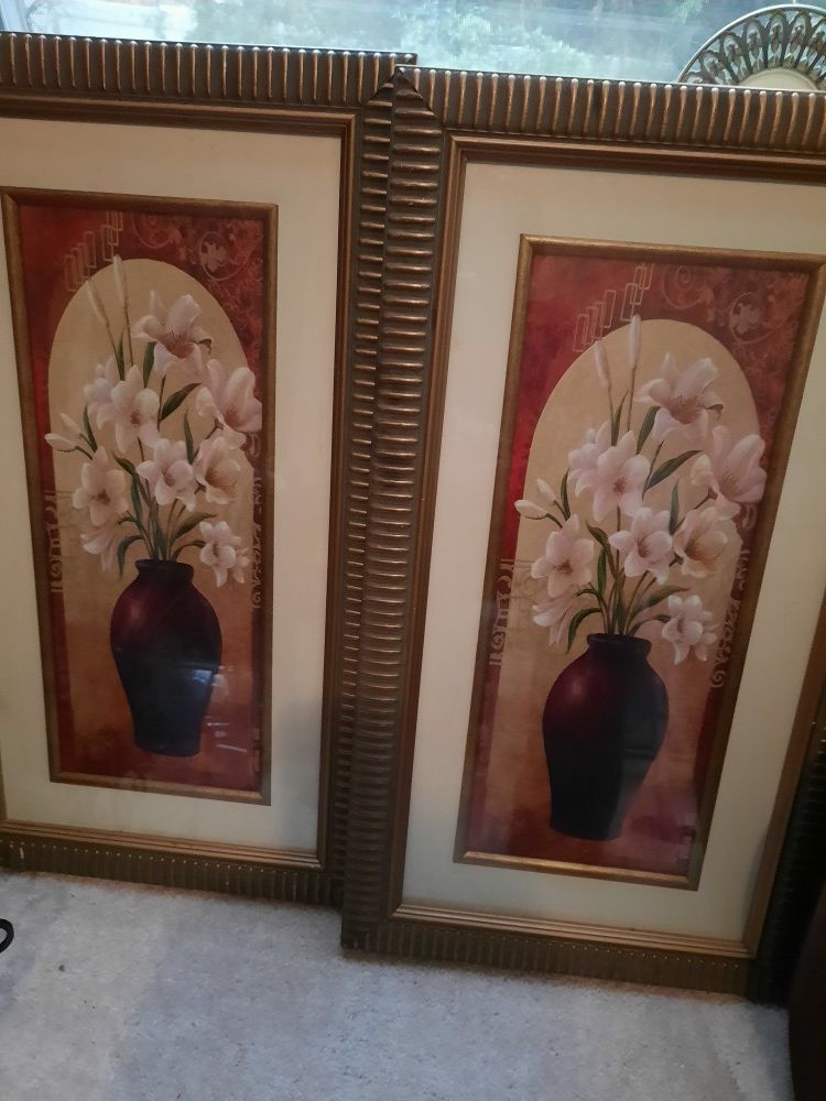 Two pics of beautiful flowers in vases set in beautiful gold frames