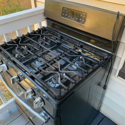 GE gas stove like new, charcoal gray color.