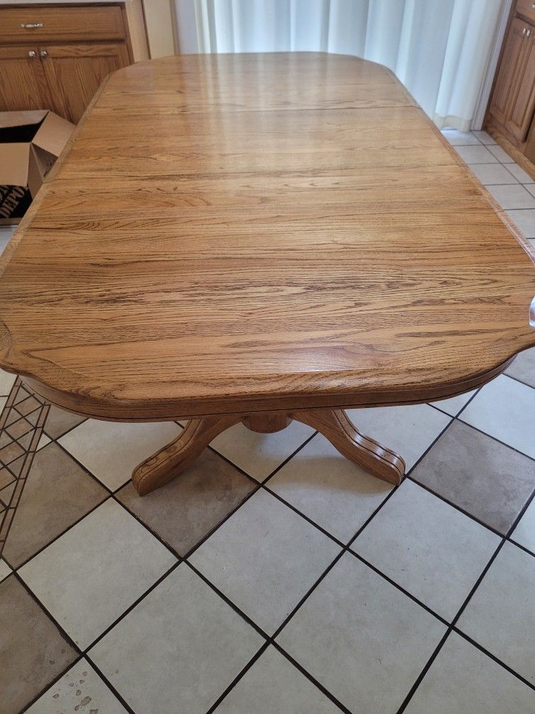 Solid Oak Dining Table. seats 8