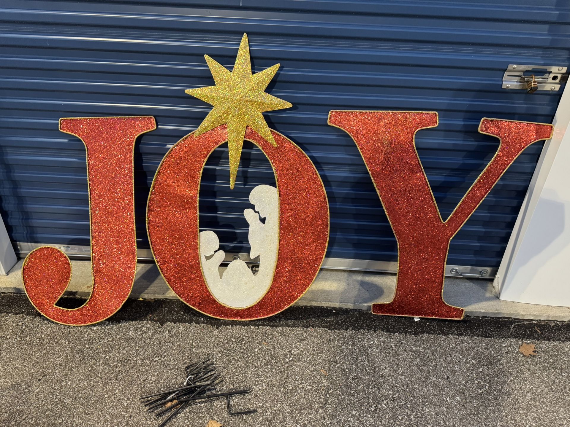 Christmas JOY Yard Decoration. It has Stakes for in ground. See pictures for Dimensions