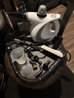 Hand held steamer