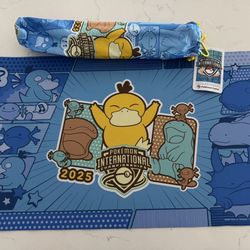Pokémon TCG NAIC 2025 Psyduck playmat and cover.