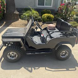 125cc black jeep for kids with helmets