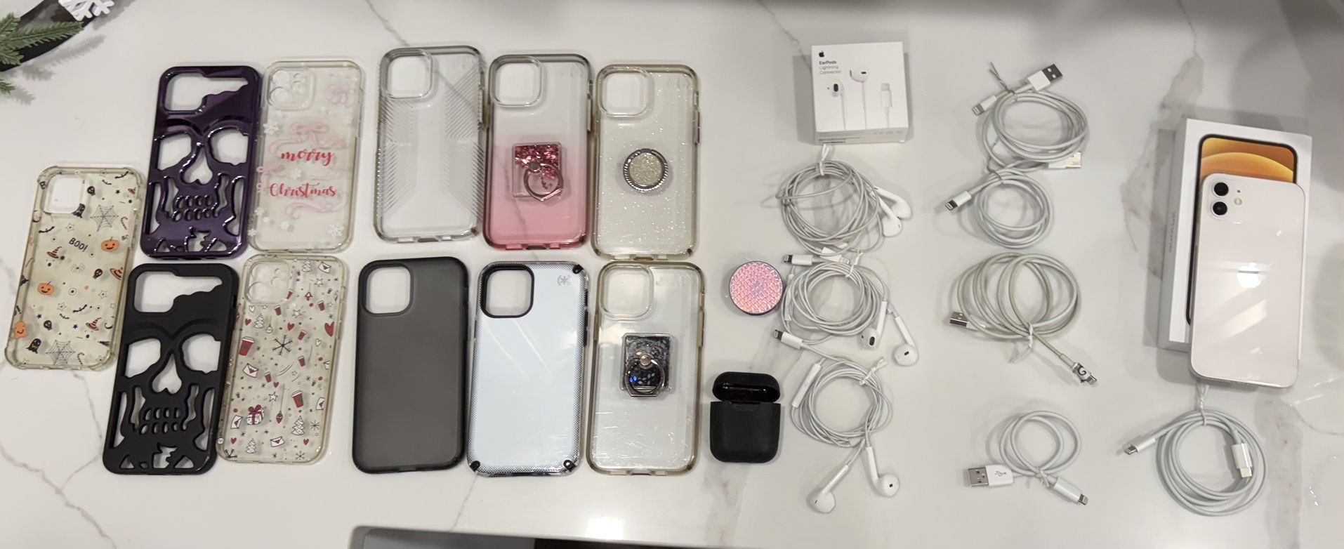 White iPhone 12 128GB W 11 Cases 5 Charge Cables 3 Ear Buds Pop Sockets 