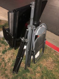 Outfoor tv & stand with chair.