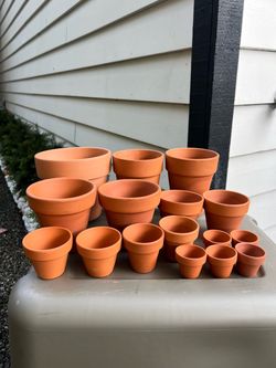 Set of 16 terracotta clay pots