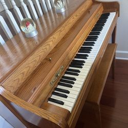 Baldwin Classic Upright Piano in an oak finish 