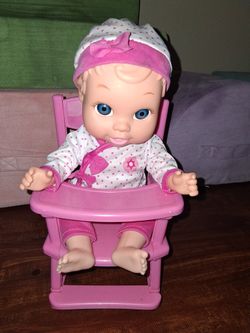 Baby Doll On A High Chair 