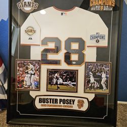 World Series champions 2014 Signed Buster Posey Jersey and frame.