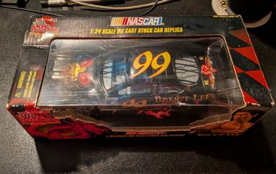 1999 Racing Champions "The Originals" 10th Anniversary 1:24 scale die-cast replica of Jeff Burton's #99 Ford Taurus feat.custom Bruce Lee paint scheme
