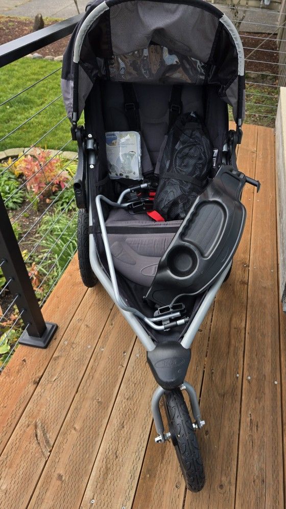 Bob Stroller w/kid tray, parent drink/gear holder,Britax carseat adapter, stroller netting and raincover!