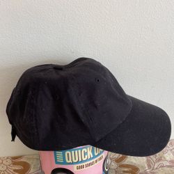 This is a black cotton baseball cap.