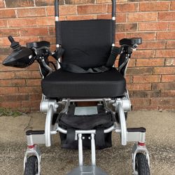 Like New Folding Electric Wheelchair