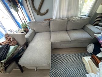 Sofa w/chaise and storage lt. grey OBO