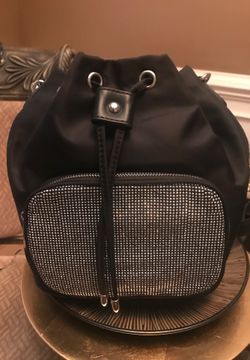 Handbag with backpack straps 9 1/2 L by 8 1/2 W