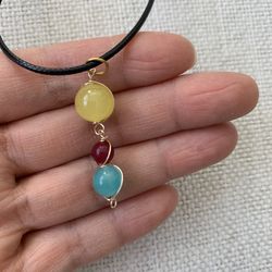 Beaded Round Pendant Necklace with Black Cord, Yellow Red Blue Glass Beads