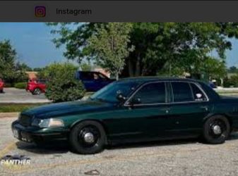 Crown Vic police wheels with tires in caps