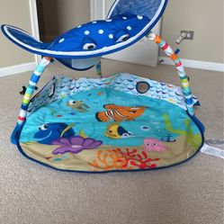 Bright Starts Disney Baby Finding Nemo Mr. Ray Ocean Lights & Music Gym, Ages Newborn +