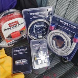 Brand new Edelbrock micro fuel pump, Universal throttle cable, 3/8 fuel line kit, Fuel pressure regulator and Heater hose fitting.