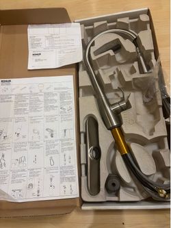 The Kohler 596-VS Simplice Pulldown,single handle kitchen faucet