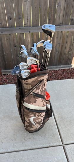 Complete golf set with callaway x-12 irons and Nike golf bag, odyssey putter
