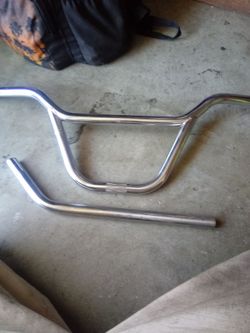 GT BMX handlebar and GT BMX seatpost (stamp GT))