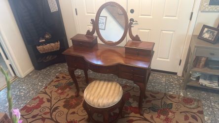 Vanity with swivel chair