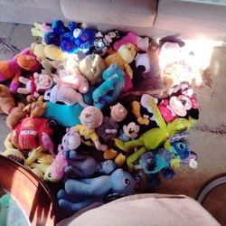 Lot Of 25 Plush Stuffed Animals Disney/Dr Seuss/Mickey/monster Inc/ Ponys