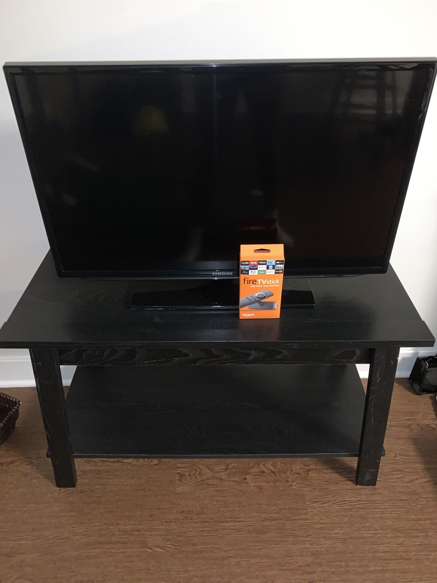 PACKAGE DEAL - TV, stand, and kindle fire stick!