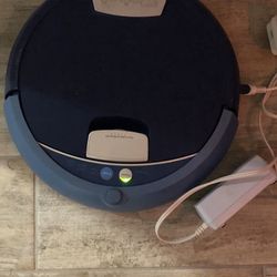 Scooba by iRobot ( Floor Washer Version of Roomba)
