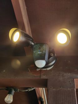 Smart LED security floodlight and camera