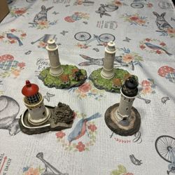Set of four miniature light houses. 