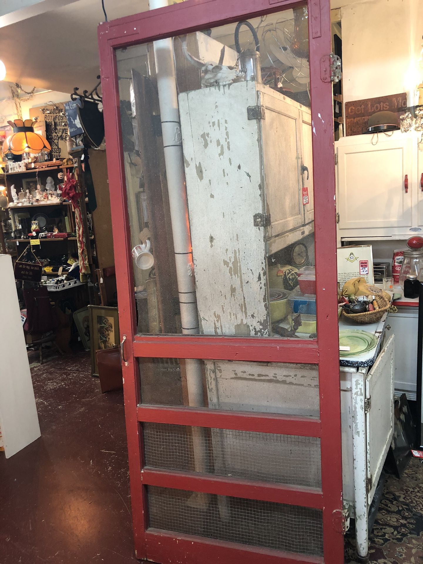 32 3/8x1x81 antique vintage porch screen red door. Bought in Smithville Texas. Has hinges and hooks. 85.00 212 north Main Street Buda furniture sterl