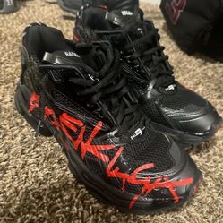Balenciaga runner red letters.