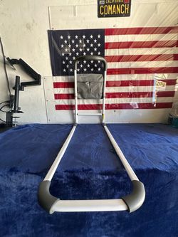 Adjustable bed assist rail