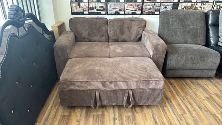 Brown corduroy pop out couch