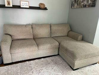 L shaped couch with pull out and storage