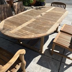Oval Expanding Teak Table With 6 Teak Chairs 