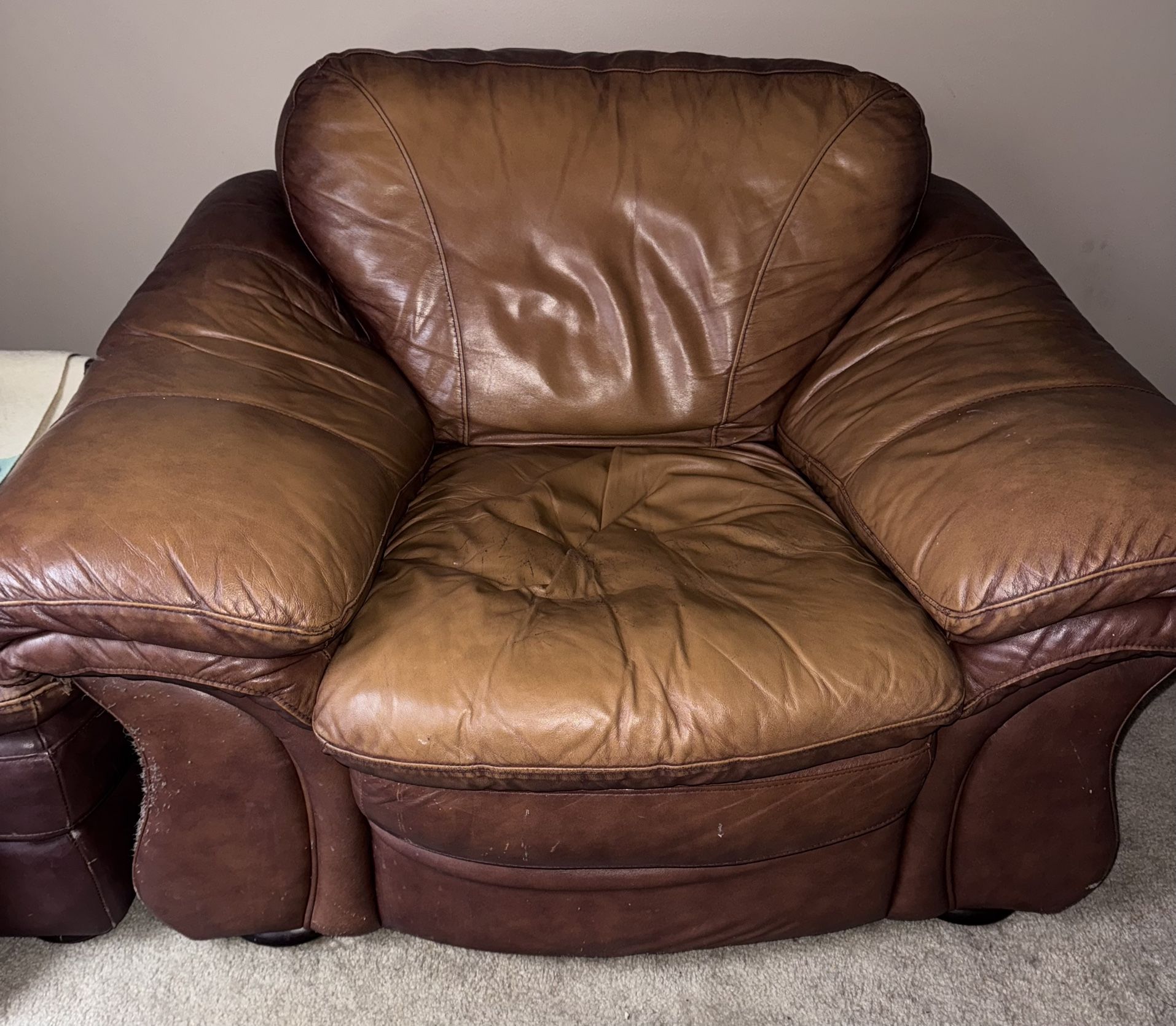 Pair of Leather Chairs and Ottomans