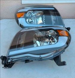 05-11 Toyota Tacoma LED DRL Headlights
Luces Micas Calaveras Faros Faroles Focos Headlamps