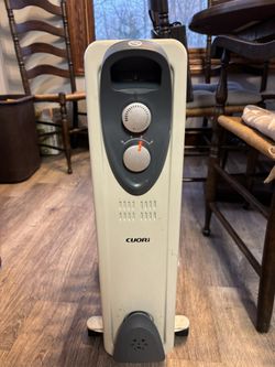 Heater Oil Filled Radiator Like New. Selection Knobs For Hear Control. On Wheels. Heard Amazingly Well. New From &60 To $80.