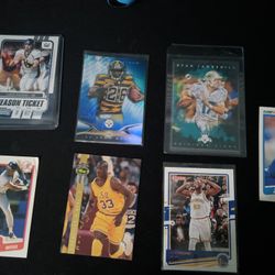 7 Collectible NBA/NFL/MLB cards 